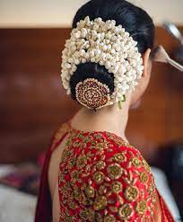 Indian bridal hair bun with flowers. Hair Flowers And Hairbun By Prakat Work Hairbun Indianbride Zardosiwork South Indian Wedding Hairstyles Bridal Hair Buns Indian Bride Hairstyle