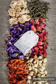(the calyx consists of the small green leaves—sepals—located at the base of the bud; Dried Flowers And Tea Leaves With Tea Package Top View Dried Plants Variety Stock Photo 293386332