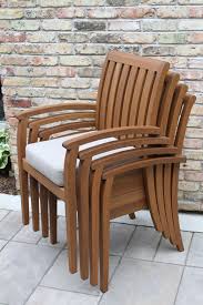 Deluxe Eucalyptus Stacking Arm Chair With Olefin Cushion 4 Pack Outdoor Dining Chairs Outdoor Wood Furniture Casual Outdoor Furniture