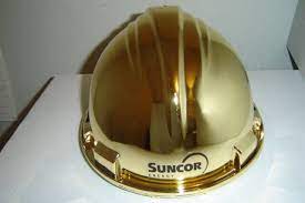 Gold Presentation Hard Hat With A Suncor Logo Www Logosonstuff Ca Hard Hat Logo Printing Logo