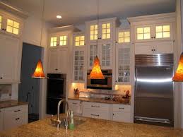 Stacked Cabinets Staggered For Visual Interest Glass Uppers To Make The Staggered Kitchen Cabinets Kitchen Cabinets To Ceiling Kitchen Cabinet Crown Molding