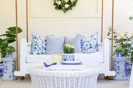 On this porch, or piazza, classic white wicker furniture is dressed with zesty, bold pillows in a fun pattern. Sunroom Decorating Ideas Home Design Lifestyle Jennifer Maune