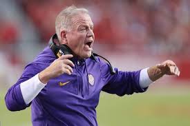 How much is Brian Kelly's current buyout at LSU?