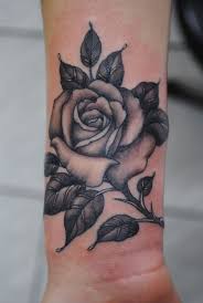 While skulls can be successful images using any tattoo approach, when applied in black and gray they. This Rose Is So Dimensional And Detailed Like An Old Photo I Know You Can See The Lines But The Rose Tattoos On Wrist Cool Wrist Tattoos Black Rose Tattoos