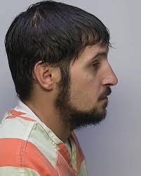 Warren, PA.--- Officials discovered early in the morning of Friday, July  7th that inmate Michael Charles Burham had escaped from the Warren County  Prison. He was last seen wearing an orange/white striped