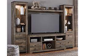 Our store features a large selection of both traditional and contemporary ashley furniture, including flat panel tv stands, tv consoles, home theater stands, entertainment centers and wall units. Trinell 4 Piece Entertainment Center Ashley Furniture Homestore