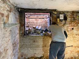 Keeping light in mind, this atlanta basement was remodeled with a plethora of windows, interior and exterior glass doors, light colors and reflective surfaces. Diy Fitting A Window In Our Victorian Basement Cellar Kezzabeth Diy Renovation Blog