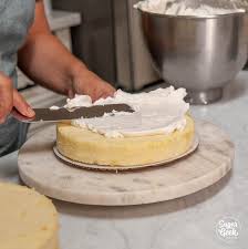 An easy, high altitude recipe for a classic vanilla cake that's moist and fluffy, frosted with vanilla buttercream, that everyone will love! Moist Vanilla Cake Easy Buttercream Video Tutorial Sugar Geek Show