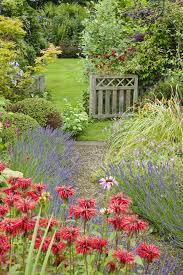 9 Lovely Ways To Make A Cottage Style Garden Cottage Garden Design Cottage Garden Charming Garden