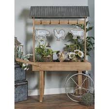 Sld.tld 00a.london 00b.london 00c.london 00d.london 00e.london 00f.london 00g.london 00h.london 00i.london 00j.london 00k.london 00l.london 00m.london 00n.london Gracie Oaks Dahlberg Traditional Roofed Flower Wheelbarrow Planter Wood In Brown White Size 75 H X 22 Wheelbarrow Planter Flower Cart Wooden Garden Planters