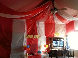 Diy Carnival Circus Tent Roll Of Red White Tablecloths Secure To Ceiling Then Use Thumbtacks To Attach Where Carnival Tent Diy Carnival Circus Decorations