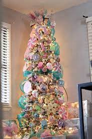 Arrange the peppermints in concentric circles on a baking sheet lined with greased parchment paper. Our 2015 Christmas Tree Damymedia Candy Land Theme Christmas Tree Christmas Tree Decora Candy Christmas Tree Candy Christmas Decorations Candy Land Christmas