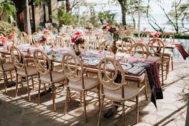 Distressed Vintage Phoenix Chairs With Long Wooden Tables And Boho Tribal Table Runners Modern Floral Design Beach Inspired Wedding Furniture