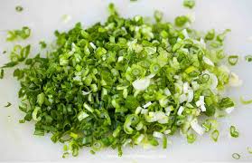 Cut the trimmed green onions crosswise into slices using a rocking motion Chinese Green Onion Pancake Oh My Food Recipes
