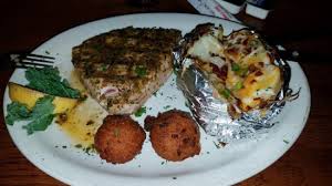 Pour into a large resealable plastic bag; Ahi Tuna Steak With Baked Potato And Hush Puppies Picture Of Bayou On The Beach Cafe Panama City Beach Tripadvisor