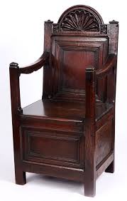 A Late 17th Century Joined Oak Arm Chair With Box Seat The Arched Shell Car Oak Armchair Armchair Chair