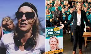 Backwards cap-wearing federal election candidate releases 'cringe' rap  video to win over voters