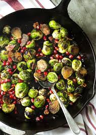 Pan Roasted Brussels Sprouts With Pomegranate Seeds Just A Little Bit Of Bacon Recipe Brussel Sprouts Roasted Brussel Sprouts Healthy Weeknight Meals