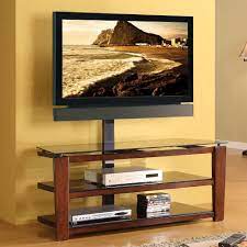 It makes your tv always at eye level for better view. Whalen Swivel 3 In 1 Tv Stand For Tvs Up To 60 Brown Cherry Finish Walmart Com Walmart Com