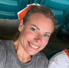 Should I get another dog to help my current dog cope with the loss of her  companion?