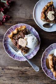 Salted Bourbon Pecan Pumpkin Pie Half Baked Harvest Recipe Thanksgiving Pie Recipes Thanksgiving Food Desserts Pecan Pie Recipe