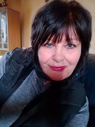 Going grey at 65, keep or color?