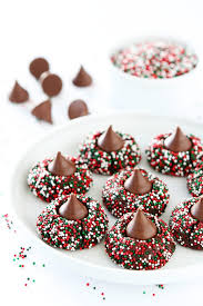 My soft and sweet sugar cookie with a twist of red and topped with a chocolate hershey kiss!!! Chocolate Kiss Cookies Recipe