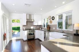 Simon creatively mixes modern applicances with vintage treasures. Vintage Modern Kitchen With Taupe Finishes Eklektisch Kuche Los Angeles Von Madison Modern Home