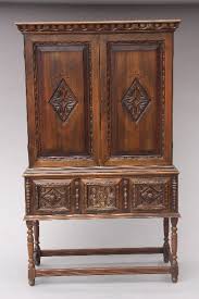1920 S Spanish Revival Carved Walnut Cabinet Armoires And Cabinets Spanish Revival Mediterranean And Eu Spanish Revival Spanish Furniture Monterey Furniture