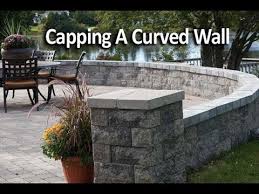 Curved stone bench in from the vine garden pany. How To Cap A Curved Patio Wall Youtube