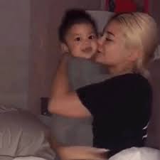Here, baby stormi got you her impression of a robot for christmasbeep boop. Kylie Jenner