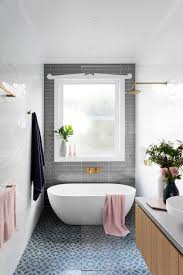 The right wall color, tilework or lighting can transform a dull, dated bathroom into a bright, stylish retreat. How To Make A Small Bathroom Look Bigger With Tile Decor Snob
