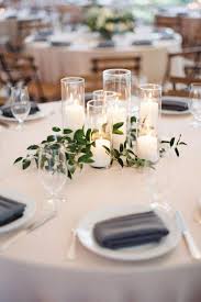 Beautiful Centerpieces Created With Candles Cheap Wedding Centerpieces Greenery Wedding Centerpieces Wedding Centerpieces