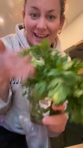 Floppy sad herbs? Don’t worry! There’s a trick to bring them back to life.,  1. Cut the ends. , 2. Add to a cup of water , 3. Place plastic bag over  herb , 4. Hang out in sunny spot