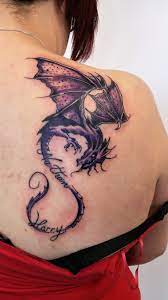 Purple Dragon Shoulder Back Tattoo With Names By Dave Dragontattoo Backtattoo Dragon Tattoo For Women Watercolor Dragon Tattoo Dragon Tattoo Back Shoulder