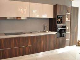 Boya malzeme olduğu için darbelerden zarar görebilir, ahşap ve laminant malzemelerden daha dikkatli. En Guzel Ahsap Mutfak Dolabi 105 Model Ornegi