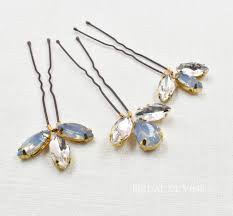For brides seeking a pale shade of blue, the powder blue tones of the bluebells hair pin set blends beautifully against all hair colours and ivory or white wedding gowns. Bridal Polar Vintage Blue Hair Pin Bridal De Vine