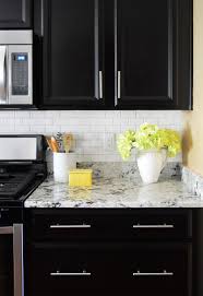 How To Install A Subway Tile Kitchen Backsplash Young House Love Subway Tile Backsplash Kitchen Backsplash With Dark Cabinets Kitchen Tiles Backsplash