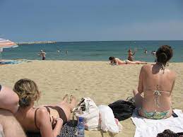 IMG_8192 | Us on the beach, with hot topless girl writing in… | Flickr