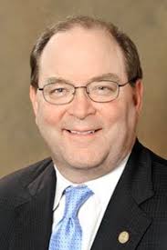 Longtime colleague says former Robertson aide is being 'railroaded' •  Michigan Advance