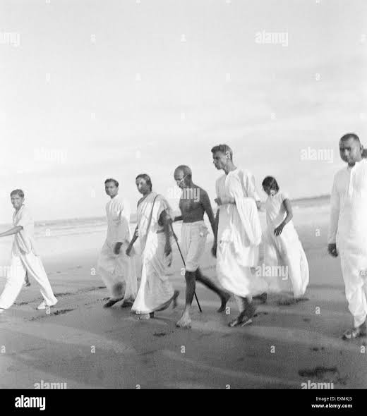 Mahatma Gandhi and others walking at Juhu Beach ; Mumbai ; May 1944 NO MR Stock Photo - Alamy