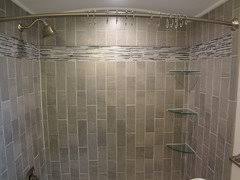 There are several things you need to gut the shower stall down to the studs. Vertical Tile Layout With Horizontal Accent Band In Shower