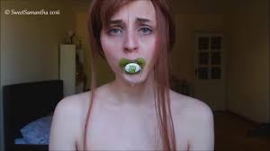 Sucking on baby pacifier - ThisVid.com