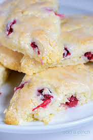 British scones are small nibbles that are fairly plain on their own, but are classically eaten with jam and clotted cream, making for a real treat. Cranberry Orange Scones Recipe Add A Pinch