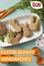 Arrange the celery, radish slices, petite carrots, remaining olives, and remaining asparagus spears down both sides of the bunny's hummus face plate with the cauliflower at the bottom of the plate. Easter Bunny Sandwiches Easter Snacks Fun Easter Snacks Fun Easter Treats