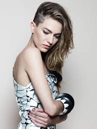 The blend of short sides with long, unrestrained hair in addition to makes for an eye catching juxtaposition. Long Hair Undercut Hairs London