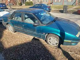 Image result for Dark Blue Green 1993 Saturn