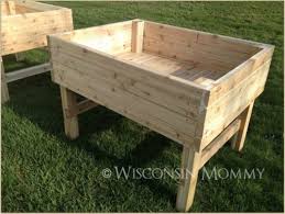 They strive in higher and deeper beds. Remodelaholic 30 Raised Garden Bed Ideas