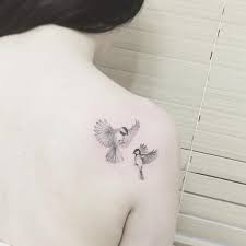 Small Bird And Rose Tattoo 
