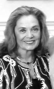 Newly elected commissioner Scotty Miley takes his seat